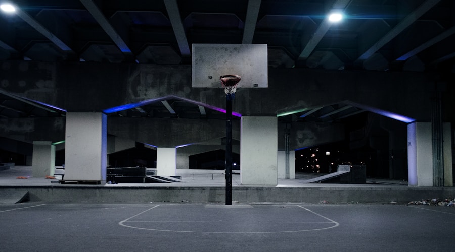 Paddleboarder gliding through early morning mist on a quiet lake