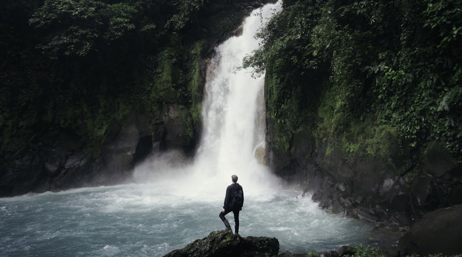 Small river town along the Trent-Severn Waterway with boats and a stone bridge